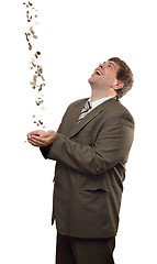 Image showing businessman catching falling money