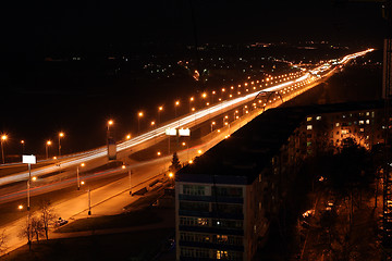 Image showing night road through bridge