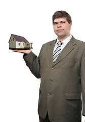 Image showing businessman with house in hand