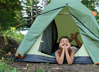 Image showing happy boy in camping tent