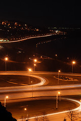 Image showing night road junction and embankment