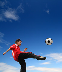 Image showing asian boy playing football