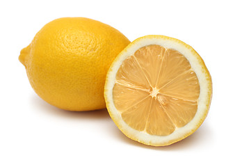 Image showing sliced and whole lemons