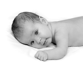 Image showing baby crawling on white sheet