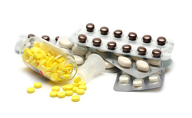 Image showing pills in bottle and blisters close-up