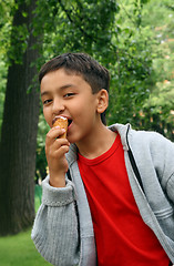 Image showing boy eating ice-cream