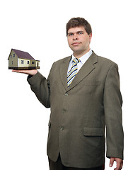 Image showing businessman with house in hand