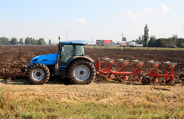 Image showing tractor with plough