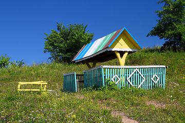 Image showing rustic arbour with well
