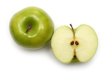 Image showing whole and sliced green apples