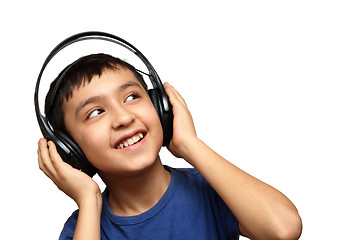 Image showing boy listening music in headphones