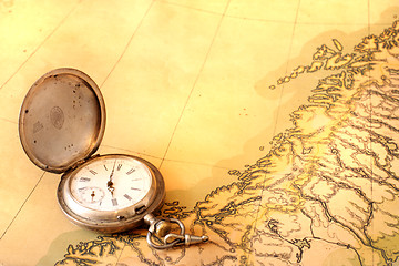 Image showing Ancient map with old silver watch