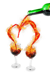 Image showing Heart from pouring red wine with fire