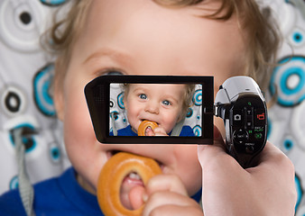 Image showing baby boy recording to camcorder