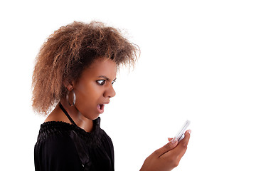 Image showing Beautiful black woman angry on the phone