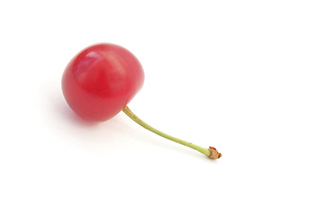 Image showing A single ripe cherry isolated on white