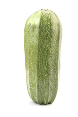 Image showing Single green zucchini isolated on white