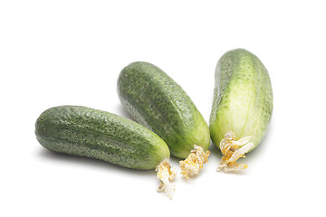 Image showing Three cucumbers isolated on white