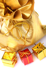 Image showing Golden bag with gift boxes