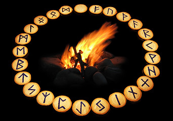 Image showing Runes around fire on black background