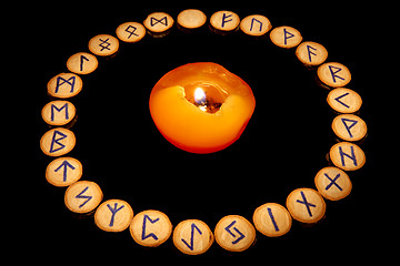 Image showing Runes around candle 