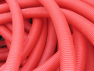 Image showing Red PVC pipes