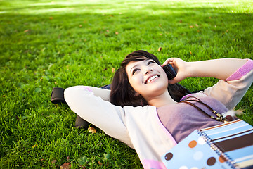 Image showing Mixed race student on the phone