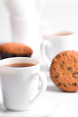 Image showing cups of coffee and muffins