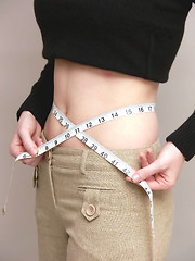 Image showing Girl measuring   