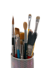 Image showing Paintbrushes in a metal mesh holder