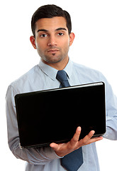 Image showing Business man with open laptop