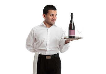 Image showing Waiter or servant looking at wine product