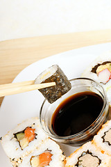 Image showing Eating sushi