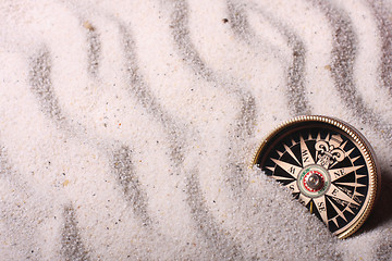Image showing Compass in sand