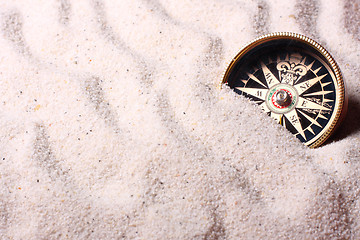 Image showing Compass in sand