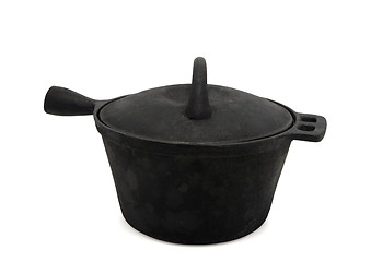 Image showing Sooty cast-iron pot