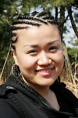 Image showing Beautiful Asian girl with braids