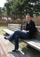 Image showing Beautiful Asian girl with braids