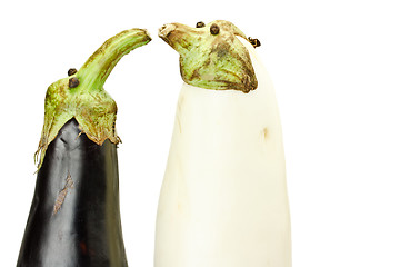 Image showing Black and white eggplants as funny puppets isolated on white