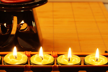 Image showing Candles and aromatherapy lamp 