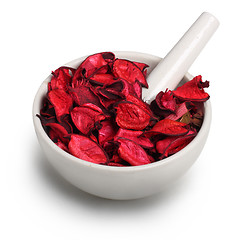 Image showing Mortar with dry rose petals