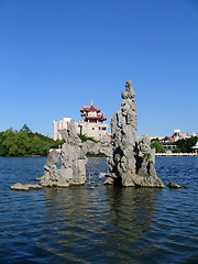 Image showing Pagoda, rocks & water