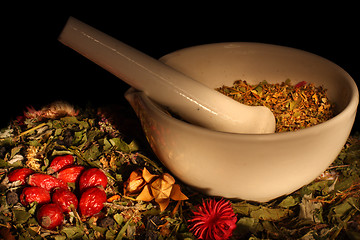 Image showing Mortar and pestle with herbs