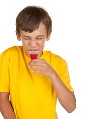 Image showing boy drinking medicine