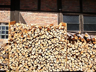 Image showing firewood outside the house in the village