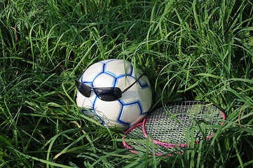 Image showing Ball, Sunglasses and Badminton Rackets