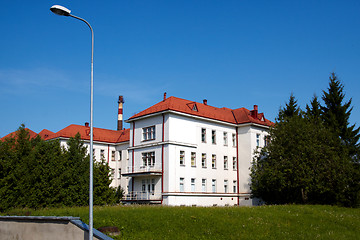Image showing building with a red tile roof