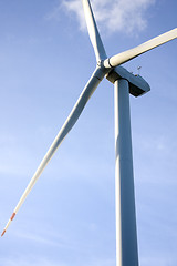 Image showing wind turbine generating electricity on blue sky 