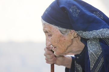 Image showing Elderly woman with stick