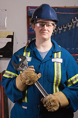 Image showing Woman with big wrench
